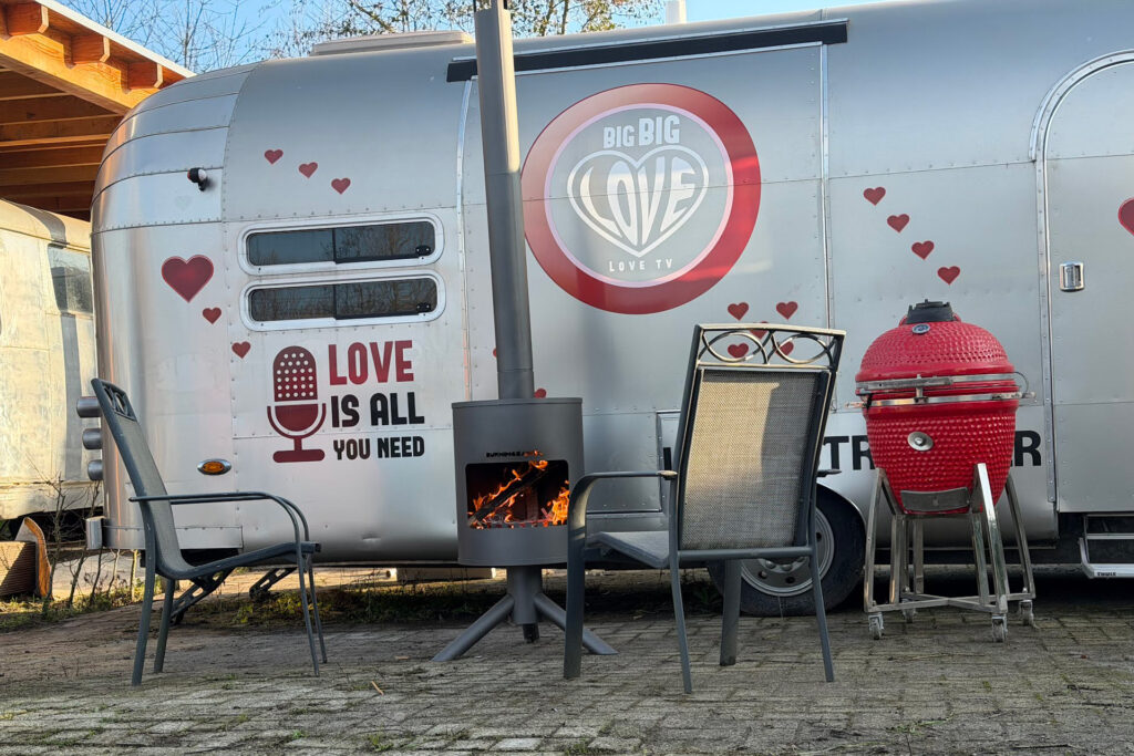 Stay overnight in the iconic All You Need Is Love caravan 1